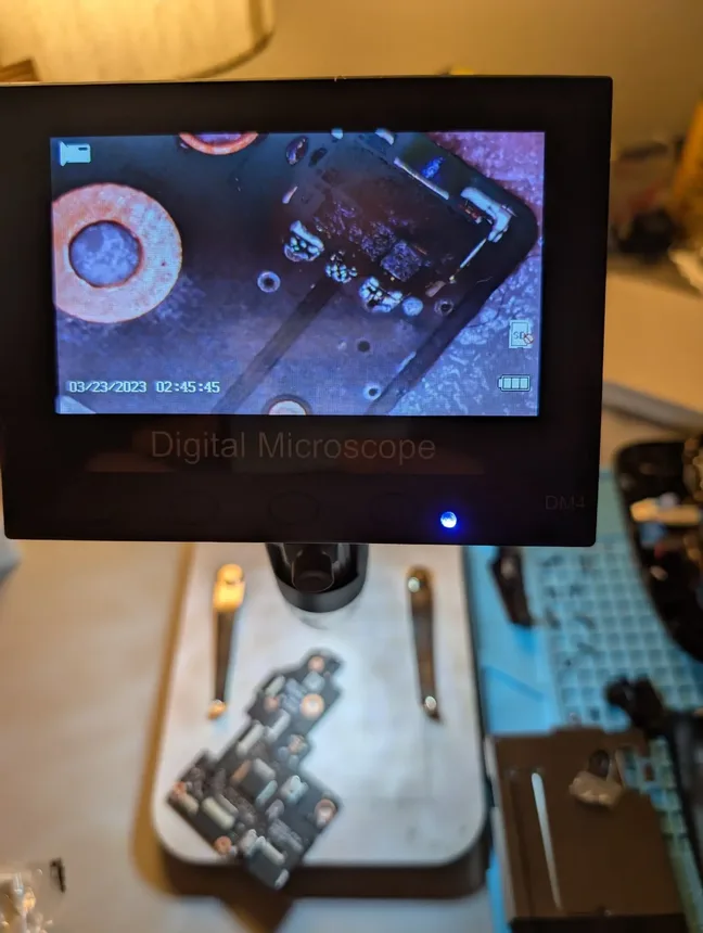 Board-level repair under digital microscope